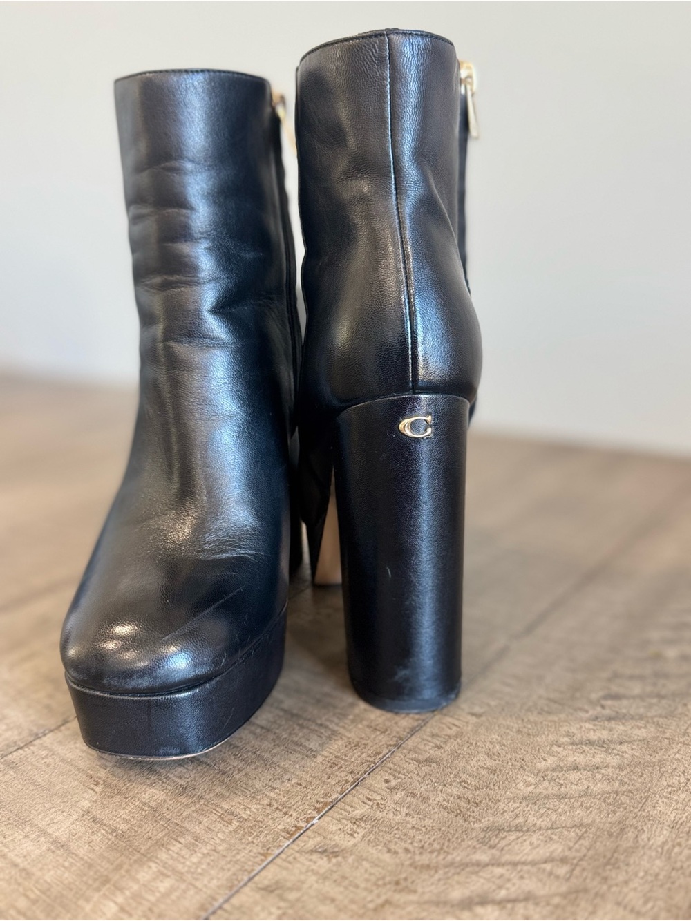 Coach Black Leather Platform Ankle Boots with Gold Accent